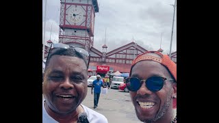 West Dem resident and GuyaneseAmerican Andy King runs into Guyana Tapestry by Stabroek Market [upl. by Mita]