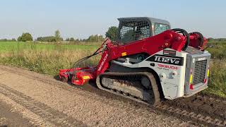 Grinds Mulches Buries TAKEUCHI TL12V2 with CONETEKS 213M Universal Rottor [upl. by Goldarina]