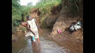 Our planless Bathing bears fruits of Joy African village life [upl. by Ecirtra]