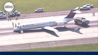 Delta flight makes emergency landing without gear [upl. by Redneval]