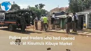 Police and traders who had opened shops at Kisumus Kibuye Market engage in running battles [upl. by Darreg]