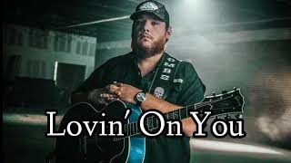 Luke Combs  Lovin On You Official Music Video [upl. by Alehcim]