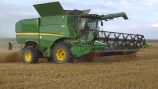 Moisson blé 2015 JD S 670i  JD 6920 [upl. by Ahseuqal611]