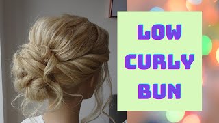 How to do a low curly bun hair tutorial [upl. by Aryamoy]