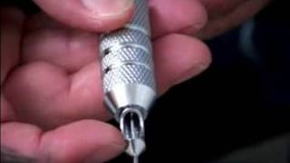 Beginning Tattooing Tips  How to Insert Needles Into Traditional Tattoo Machine [upl. by Nrobyalc132]