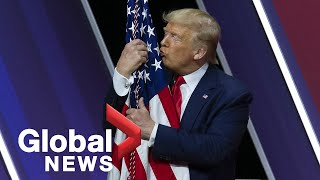 President Trump hugs gives kiss to American flag at CPAC Conference [upl. by Orag]