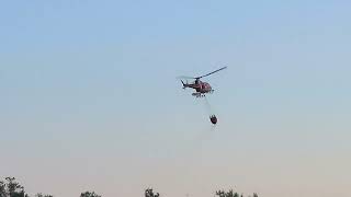 Expedition Helicopters Inc fighting fire at Rockshield  Cochrane Ontario [upl. by Nylrebma]