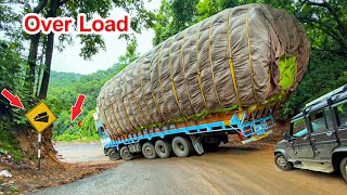 Lorry Videos  Heavy Overload Truck Dare Drive On Risky Ghat Downturns  Truck Video  Trucks in Mud [upl. by Eahsram228]