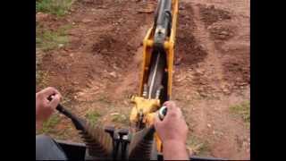 Operação de retroescavadeira vídeo aula Backhoe Operation Classroom Video [upl. by Nomolos]