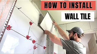 How to Install Tile on the Bathroom Wall StepbyStep [upl. by Lirpa24]