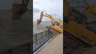 Excavator climbing onto a barge [upl. by Melia]