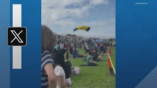 Navy parachutist lands on 2 spectators injuring them [upl. by Mil]