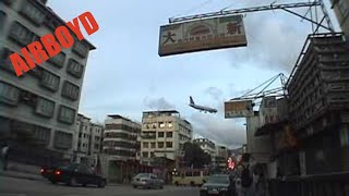 Plane Over Kowloon City Landing Hong Kong Kai Tak Airport [upl. by Runkel281]