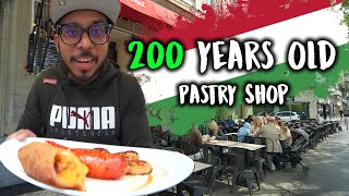 Eating in the oldest Hungarian pastry shop Viral Street Food Tour in Budapest 🇭🇺 [upl. by Enihsnus]