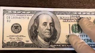 Finding a series 2001 one hundred dollar bill in perfect condition [upl. by Etan765]