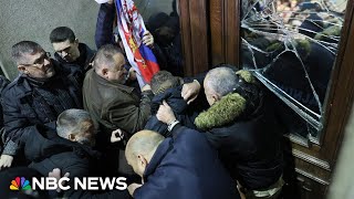 Serbia election protesters try to storm capital’s city hall [upl. by Mcclelland]