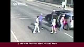 South Africa Surveillance footage showing carjackers pouncing on victims [upl. by Keslie]