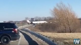 Michigan Wolverines Charter Plane Slides Off Runway [upl. by Suelo]