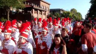 The Cornhusker Marching Band comes down Stadium Drive  92609 [upl. by Yliah]