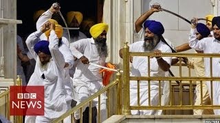 Sikh groups clash with swords at Indias Golden Temple  BBC News [upl. by Rtoip423]