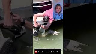 Pelican gets a fish stuck in his throat and a man rescues him Must see it now sealife seafood [upl. by Arratahs]