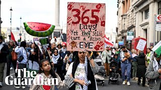 Thousands of proPalestinian protesters march through central London [upl. by Pirnot]