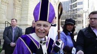 Cardinal George returns to Mass [upl. by Einwahr]