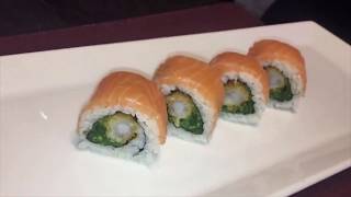 Uramaki Sushi Roll  Salmon Tempura Shrimp Wakame Seaweed Salad [upl. by Alikahs841]