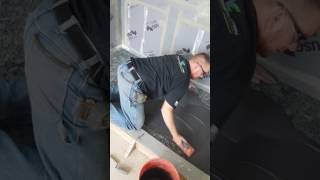 Grouting the pebble shower pan with TEC Power Grout and Plasticizer [upl. by Weitzman]