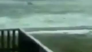 Man SURFS through giant waves during hurricane IRMA meme [upl. by Eelyk]