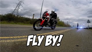 AFRICA TWIN  STOCK EXHAUST  START UP AND FLY BY  MotoEdits [upl. by Sungam]