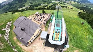 Wingsuit Flyby Of A Cable Car Station  Rotwand  Dolomites [upl. by Aicnetroh982]