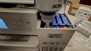 Filling the Epson EcoTank ET 3850 Wireless Color Supertank Printer with ink [upl. by Ragas]