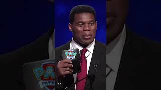 Herschel Walker Flashes His Paw Patrol Police Badge During Georgia Senate Debate [upl. by Leahcimaj]