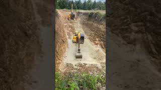 Excavator Stuck in Mud Watch the Rescue Operation shorts [upl. by Asiruam]