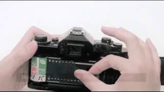 How to Load Film for Canon A1 35mm SLR [upl. by Wind512]