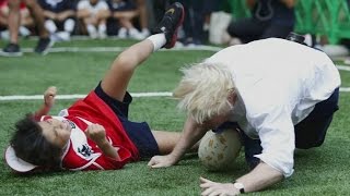 Boris Johnson knocks a child to the ground in touch rugby [upl. by Mehsah290]