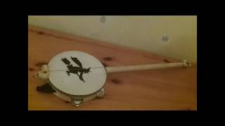 How to make a Broomstick Tambourine Banjo and play A Hard Rains Gonna Fall on it by B93 [upl. by Namialus]