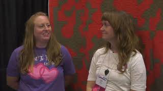 Katie Rock and Jen Schechinger display their quilt at AQS QuiltWeek  Des Moines 2022 [upl. by Melisent]