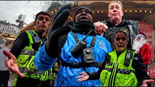 SECURITY GOES HANDS ON TRIES TO MOVE US FROM PUBLIC POLICE ATTEND  Cardiff CHRISTMAS Market [upl. by Volnay565]