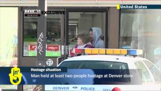 Hostagetaker shot by Denver police US cops take down man behind convenience store holdup [upl. by Oironoh230]