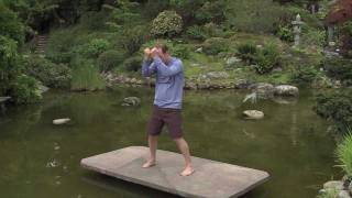 OneMinute Qi Gong  Golf Stretching [upl. by Salisbarry]