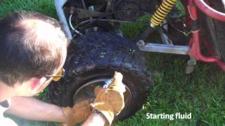 How to seat inflate a tire with starter fluid [upl. by Ahsoem311]