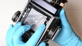 Replacing the focusing screen in a Rolleiflex SL66 [upl. by Einnol]