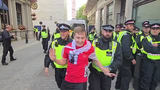 Palestine supporter tries to antagonise Tommy Robinson supporters police make a cordon in the road [upl. by Niran236]