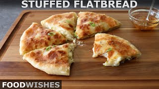 Cheese and Potato Stuffed Flatbread  Food Wishes [upl. by Eentroc]