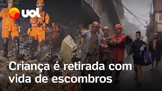 Petrópolis menina de 4 anos é retirada com vida de escombros após pai usar corpo para protegêla [upl. by Aphra144]