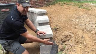 Installation of a Retaining Wall with a Sock Drain [upl. by Aubree284]