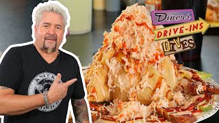 Guy Fieri Eats a Seafood Volcano in New Orleans  Diners DriveIns and Dives  Food Network [upl. by Yllier]