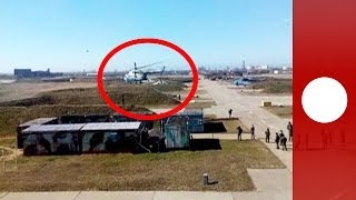 Video Ukrainian pilots escape with aircraft as troops take over air base [upl. by Hazeghi]